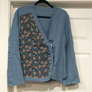 NWT Buykud crossover blue blouse with fabric buttons